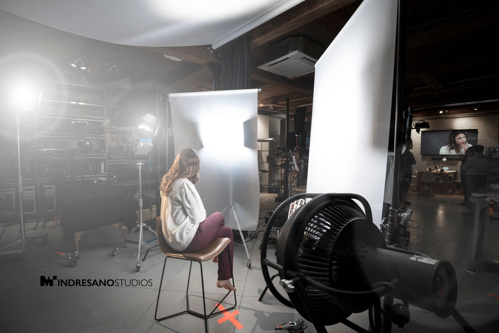 Boston photographer capturing model wearing stylish jewelry during fashion photo shoot