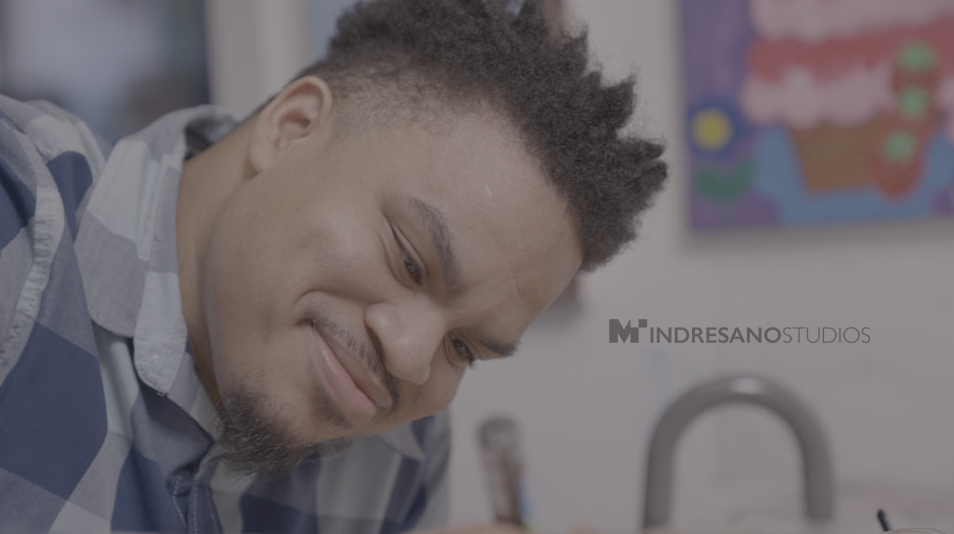 Unedited corporate interview footage showing dull tones and low contrast prior to color correction.